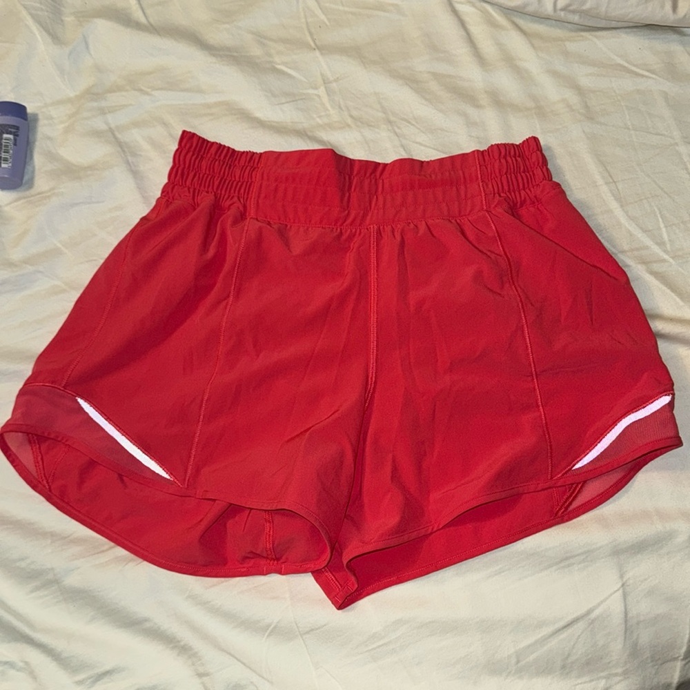 Lululemon high rise hotty hot shorts in hot pink size 6. Like new. 4”